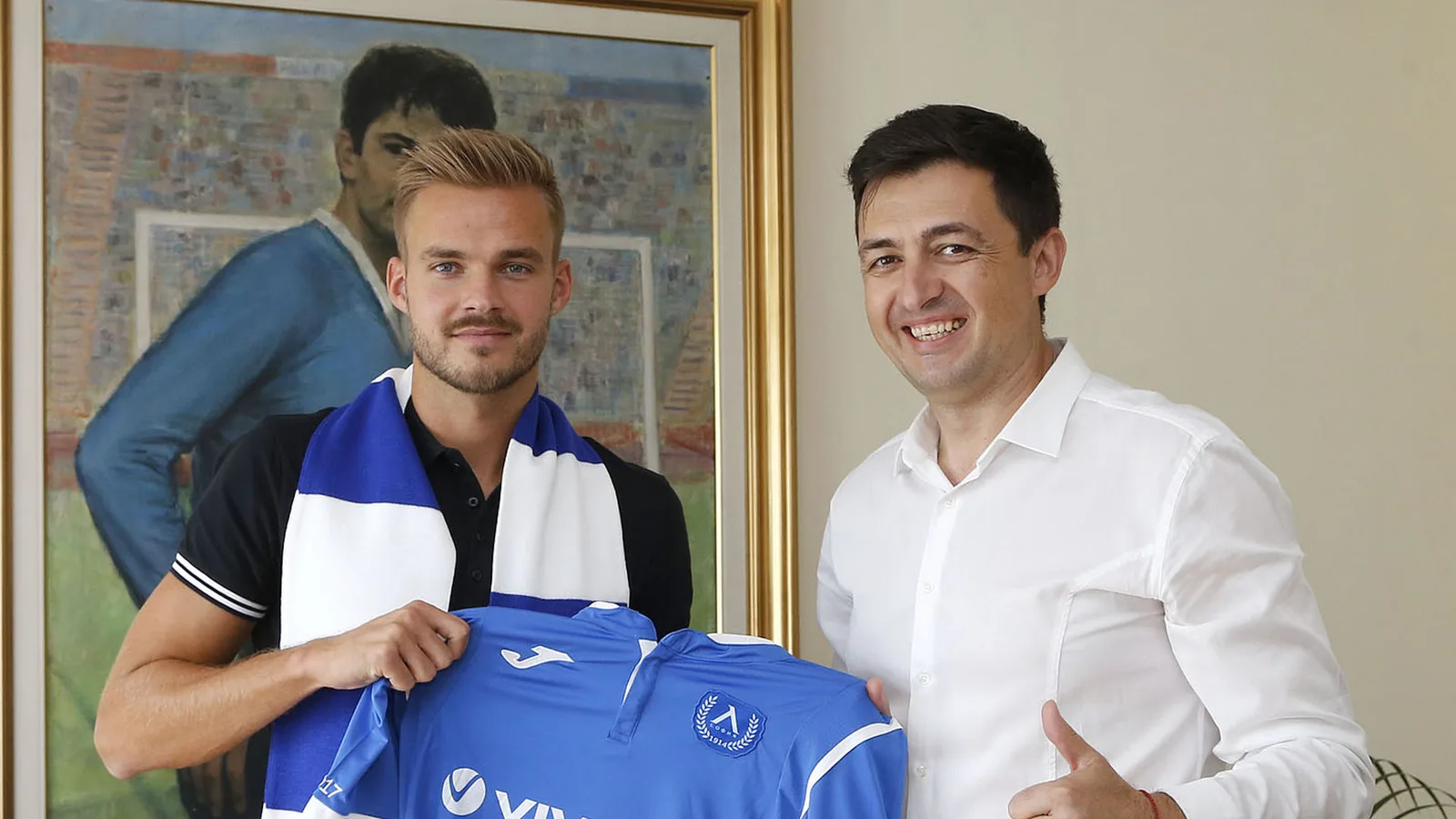 Archive: Holmar Eyjolfsson (left) signing for Levski on 1 September 2017; not the 2026 retirement announcement. Official club photograph cropped to 16:9.